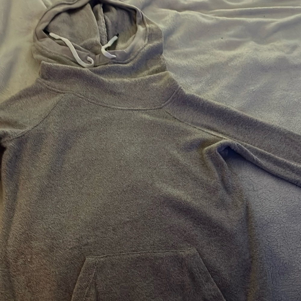 Tan sweater hoodie with cowl neck.